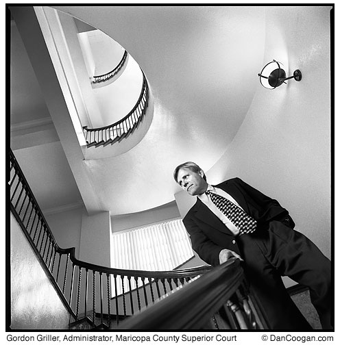 Gordon Griller, Administrator of the Maricopa County Superior Court walking down the stairs at the old Courthouse, Phoenix, AZ