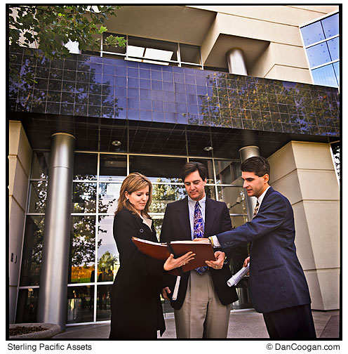 Sterling Pacific Assets, three people reviewing the Red book.
