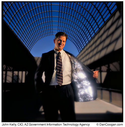 John Kelly, CIO and Director, Government Information Technology Agency, State of Arizona, with foil lining his jacket, Silver Lining of Y2K