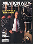 Dan Burnham, President, Allied Signal Aerospace, stands in a jet engine test cell, thumbnail of the cover of Aviation Week magazine 8/15/94 issue